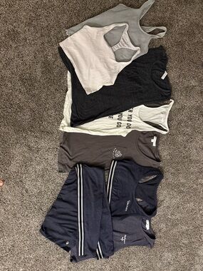 Spiritual Gangster 8 piece yoga separates. 1 pant, 3 Bras, 3 tanks, 1 tee